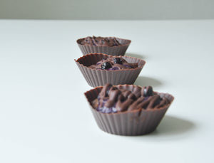 Blueberry and almond butter cups with cocoa mass